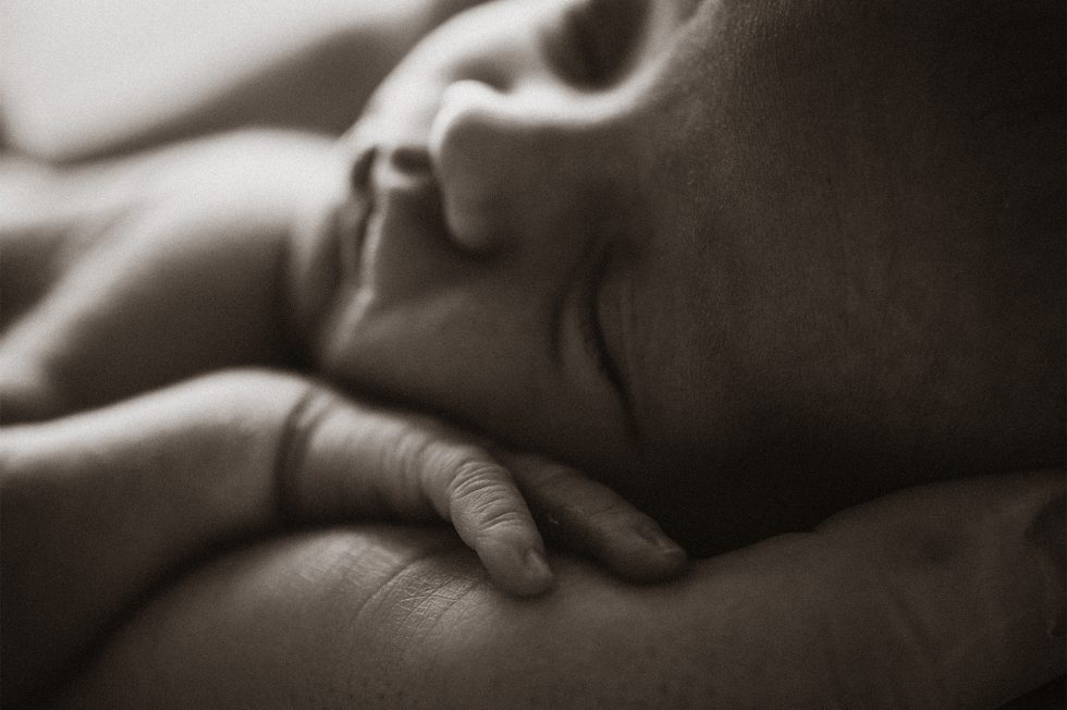 fotografia dulce un newborn dormido